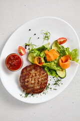 Juicy beef steak with a side of fresh vegetable salad, perfect for healthy menus and food blogs