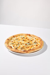 Italian Quattro Formaggi Pizza with Four Cheeses Isolated on White