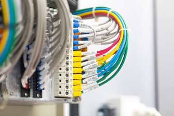 Fiber Optic cables connected to an optic ports in a data center