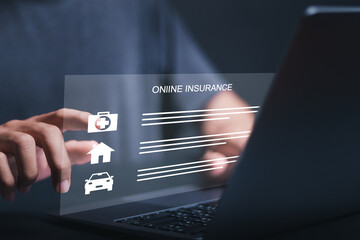 Online insurance concept, Person use laptop fill out insurance documents online for car, family and life, financial and health insurance.