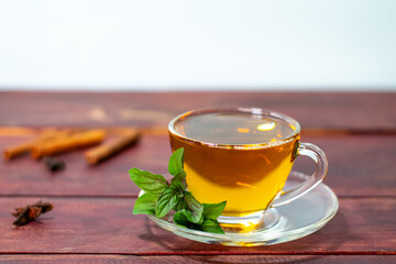 Mint tea on a wooden table
