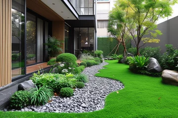 Foto op Plexiglas outdoor grass in backyard landscaping style inspiration ideas © NikahGeh