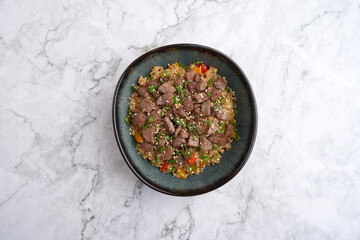 Fried rice with beef and vegetables bowl
