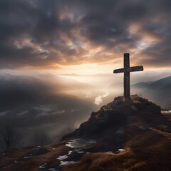 cross standing by the roadside in a misty winter mountain valley
