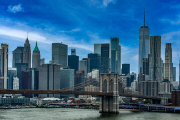 Brooklyn Bridge with the blue sky linking the boroughs of Manhattan and Brooklyn in New York (USA)...
