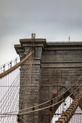 Upper left side of the Brooklyn Bridge linking the boroughs of Manhattan and Brooklyn in New York City (USA). It was the largest suspension bridge in the world, record span until 1889.