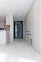 View of the entrance door in the renovated corridor