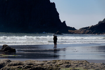 person walking on the beach