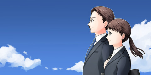 スーツ姿の若い男女　横向き上半身　青空背景
