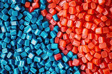 Dyed synthetic polymer resins granulates. Recycled plastic granules with mixed colors