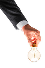 Business hand gripping a light bulb on a white background. Energy solution concept