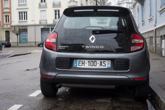 Mulhouse - France - 11 february 2024 - rear view of grey Renault Twingo 3 parked in the street by rainy day