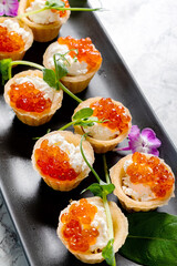 canape with salmon on plate