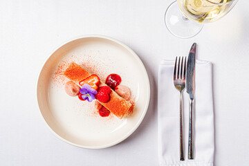 cake with strawberries and flowers