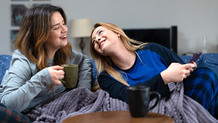 two girls using smart phone