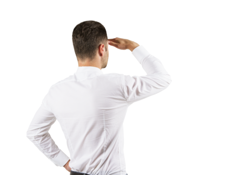 Man in white shirt looking into the distance with hand to forehead. Vision and future concept