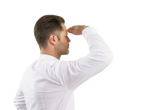 Man in formal wear saluting towards the horizon, leadership and success concept