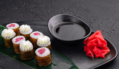 sushi maki rolls with tuna inside with Philadelphia cheese © AntAlexStudio