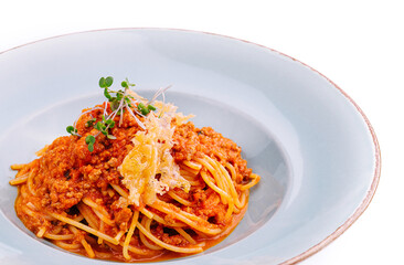 Spaghetti bolognese with parmesan cheese and tomatoes