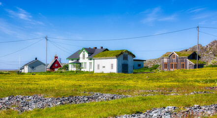 Fototapeta na wymiar Buildings in the Abandoned Fishing Village of Hamningberg in Batsfjord on the Varanger Peninsula, Finnmark, Norway