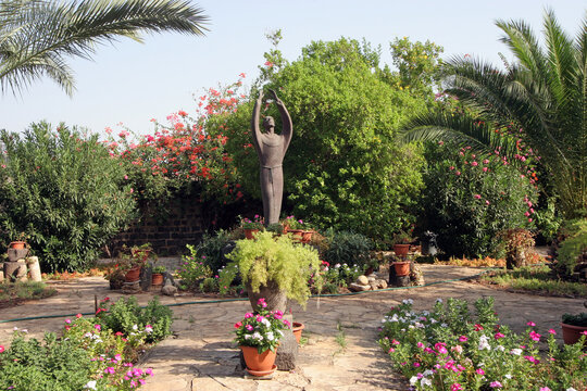 Saint Francis of Assisi statue in the Garden of Church over the House of Peter in Capernaum at the Sea of Galilee, Israel