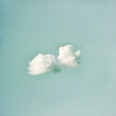 A pair of simple, white clouds against a light blue background, representing tranquility. 