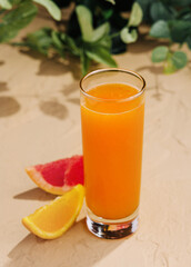 Citrus juice with orange and grapefruit top view