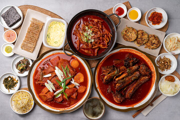 Korean food, pollack, braised pollack, stingray, soup, chicken feet, meat pancakes, pork skin, grilled, side dishes, anchovies, steamed eggs, bean sprouts, potatoes,