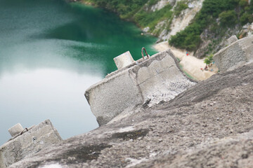 Close-up concrete anchored retaining walls installed on cliff. © Benjamin Salazar 