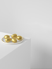 Golden Easter eggs on a white plate. A plate of eggs stands on a white cube. There is a place for the text. Use it for an Easter greeting card.