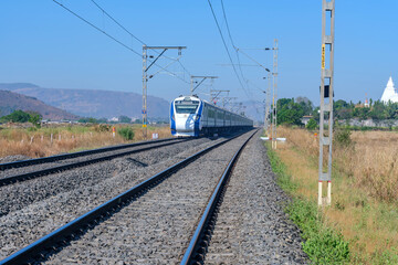 The Solapur Mumbai Vande Bharat Express Train heading towards Mumbai, near Pune India.