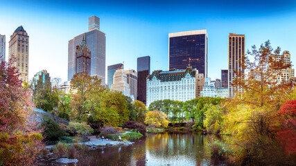 Central Park in Manhattan, New York City in fall colors. In the autumn you can see the beautiful colors of the leaves turning red, yellow and brown. 