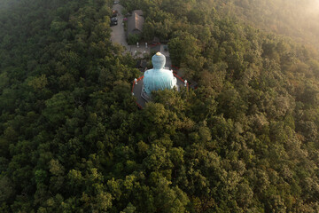 Aerial view of The Great Buddha at Doi Phra Chan is a towering bronze Buddha statue that can be...