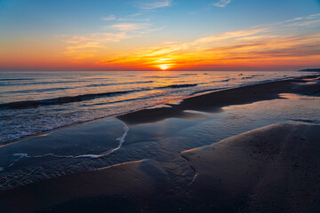 Brightly colorful sunrise on the sea coast