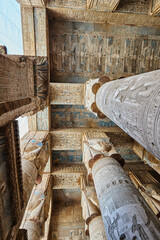 Fototapeta na wymiar Colourful astronomic ceilings and Hathoric columns from the hypostyle hall in Dendera, Egypt