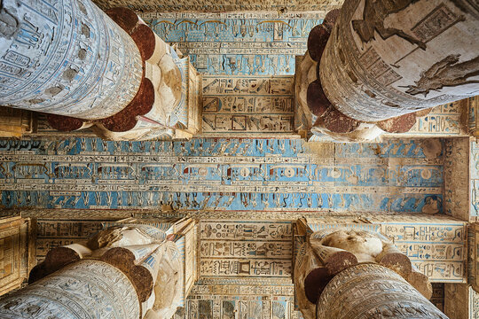 Colourful astronomic  ceiling with celestial scenes and hathoric columns in the hypostyle hall in Dendera temple, Egypt