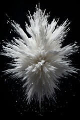 White powder explosion on black background