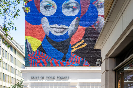 London, UK - June 10 2023 : Duke of york square shopping centre, on kings road Chelsea, by Saatchi Gallery and sloan subway station. Mural art for 'beyond the streets' exhibition by Studio BAD