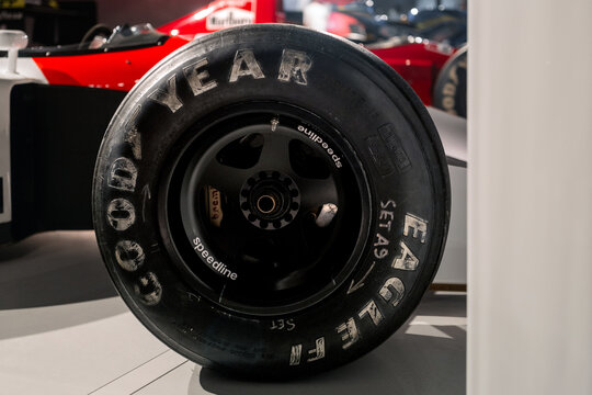 Silverstone, UK - August 13 2023 :  Close up detail of the Goodyear eagle f1 tyre, speedline wheel and brembo brakes from Ayrton Senna’s 1991 McLaren MP4 6 at on display at a motorsport circuit museum
