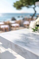 White marble table for mockup, blurred wedding background