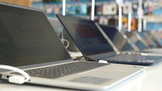laptops on display in a store