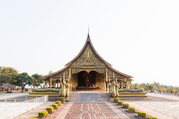 Aerial view of Wat Sirindhorn Wararam (Wat Phu Prao) Chong Mek, Sirindhorn District, Ubon Ratchathani Thailand, Beautiful Temple near the Thai-Laos Border town, Wat Temple at the evening	