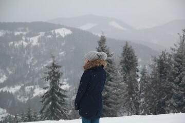 person in winter forest