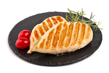 Grilled chicken fillet, isolated on white background.
