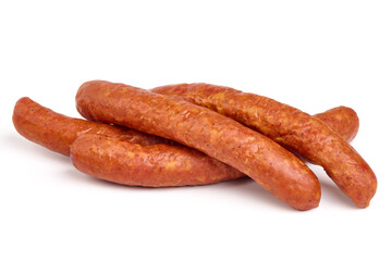 Long thin smoked sausages, isolated on white background.