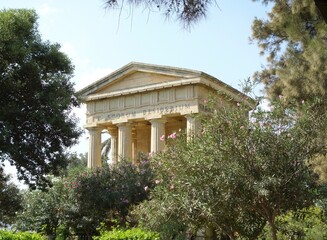 Fototapeta na wymiar Ancient temple in a garden