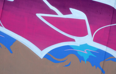 Colorful background of graffiti painting artwork with bright aerosol outlines on wall. Old school...