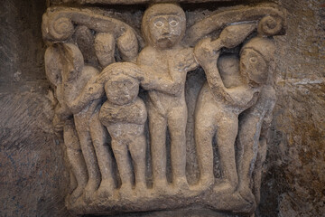 grabbing the hair in a possible fight, the girl with the braids roman capital, San Martín de Elines, Valderredible region, Cantabria, Spain