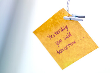 Concept shot of the sticky note with motivational quote in it. Self development