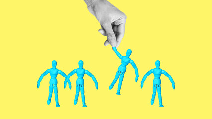 A group of wooden mannequins, one mannequin with raised his hand is choose. HR concept, human resources, volunteering. The character wants to apply for a job